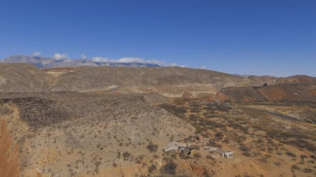 VIRGIN RIVER, UTAH, USA - February 07, 2025: Flying over the remains of the Babylon House, the Stormont Silver Mill ruins and the Virgin River