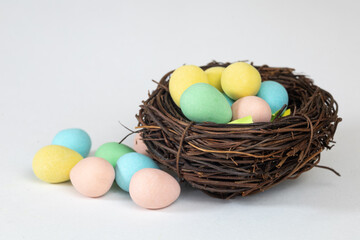 easter eggs in a nest isolated on white.