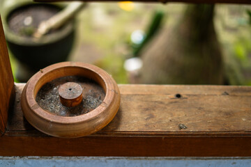 Wooden cigarette ashtray