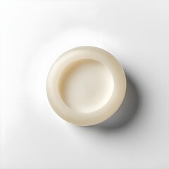 Cream-Colored Circular Dish on White Background