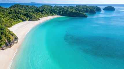 Fototapeta premium Pristine tropical beach with turquoise waters and lush greenery
