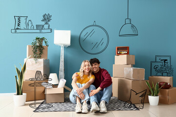 Young couple with belongings imagining interior of new house. Moving day