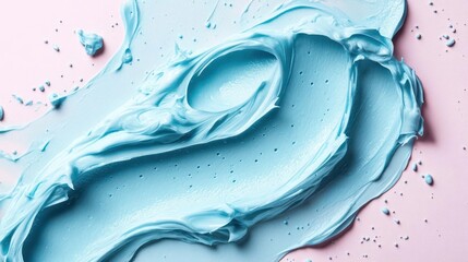 blue paint splattered on a pink background