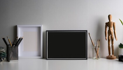 Black Framed Artwork on Artists Desk Minimalistic Studio Ambiance Filled with Industrial Textures and Rich Tones, Evoking a Serene Creative Energy