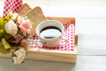 Bread cup of coffee on a white background