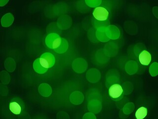 Obraz premium Abstract green bokeh defocus glitter blur background with soft and dreamy bokeh lights for artistic design projects, background, blur, green