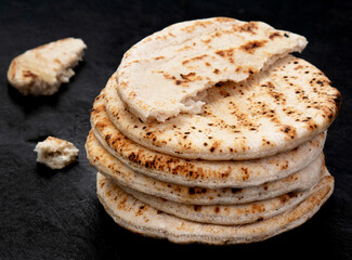 .Pita bread on dark background.