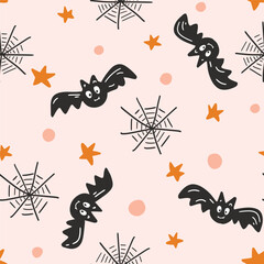 Flying bats with spiderwebs, stars and moons in background as Halloween spooky scene in color palette of orange, black and pastel peach on cream background. Seamless vector pattern.Great for packaging