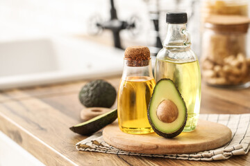 Bottles of fresh avocado oil on kitchen counter