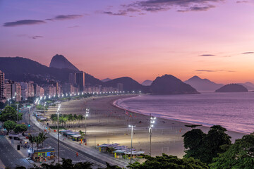 Copacabana Beach and Sugar Loaf Mountain at twilight with incredible violet morning light, Rio de Janeiro, Brazil	