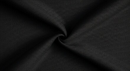 Fototapeta premium Black fabric texture with subtle folds.