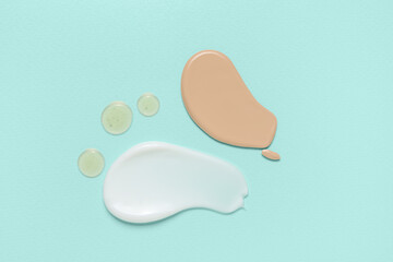 Samples of natural cosmetic products on mint background