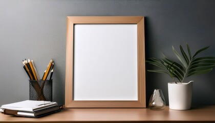 Office Desk Scene with Poster Frame Showcasing Vintage Style Artwork, Elevating a Modern Workspaces Ambiance with a Hint of Retro Charm.