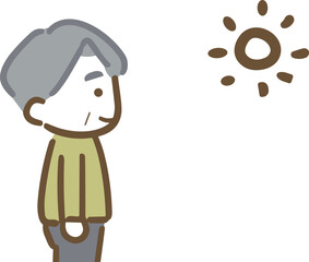 太陽を眺めているシニア男性