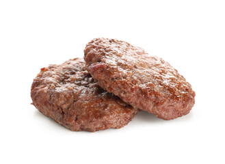 Tasty meat cutlets on white background