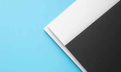 Abstract geometric background with blue, white, and black paper layers.