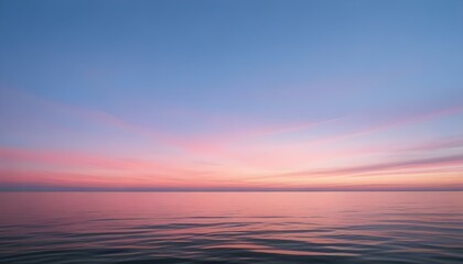 Obraz premium Simple calm blue sea, ocean under a sunset sky. Gradient sky, gradient sea, colourful, pink sky, purple sky, blue sky, orange sky. Calm mood, mood photo, sea, sky background. Landscape. heaven, dawn. 