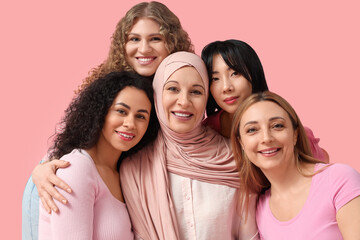 Group of beautiful women smiling on pink background. Women's History Month