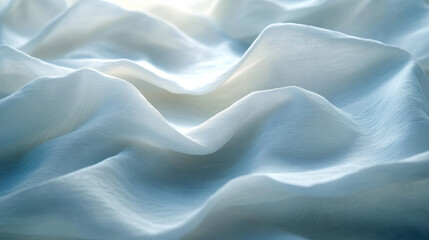 Obraz premium Soft, flowing white fabric with gentle waves and textures creates serene atmosphere