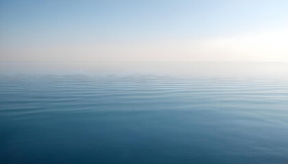 Obraz premium Simple calm blue sea, ocean under a blue sky. Calm mood, mood photo, sea, sky background. Landscape. heaven, dawn. Spiritual, wellness, meditation, summer, zen. 
