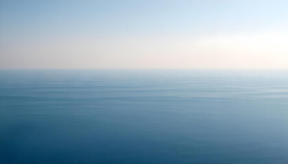 Obraz premium Simple calm blue sea, ocean under a blue sky. Calm mood, mood photo, sea, sky background. Landscape. heaven, dawn. Spiritual, wellness, meditation, summer, zen. 