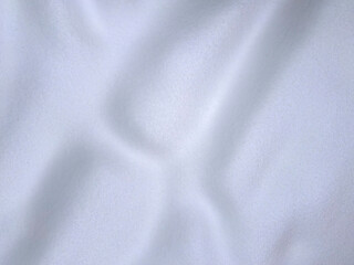 Background of different shapes under fresh snow cover