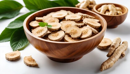 Dried Baical Skullcap Slices in Wooden Bowl with Roots and Leaves