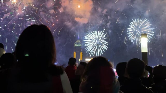 Massive Chinese New Year Countdown Celebration Fireworks in Hong Kong. Spectator view. Celebratory atmosphere.