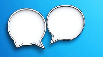 Two White Speech Bubbles on Light Blue Background