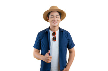 Portrait of a young Asian man wearing a tourist shirt, hat, and sunglasses posing on background