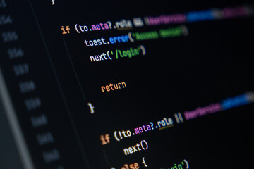 close-up of computer screen with colorful programming code lines, focus on return keyword, software...