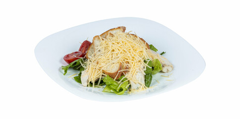 Salad with bread, cheese, lettuce, and tomatoes on a plate