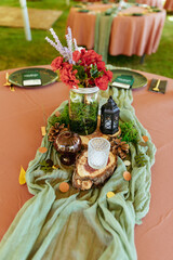 Whimsical garden backyard wedding table centerpiece