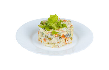 A colorful salad on a white plate contrasts with a clean background