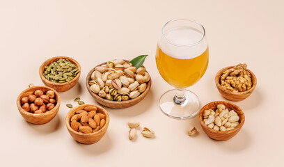 A vibrant assortment of various nuts and beer