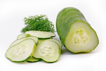 Fresh cucumber and dill isolated on white. Sliced vegetable.