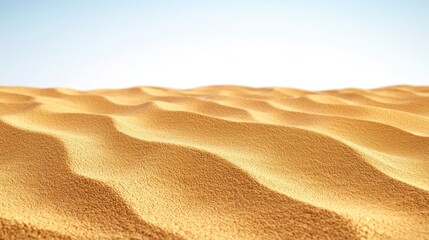 Vast Expanse of Golden Sand Dunes Under Clear Blue Sky Creating Serene Atmosphere
