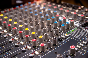 Fototapeta premium Blue DJ audio mixer shot close-up 