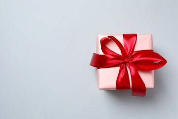 Beautiful gift box on gray background