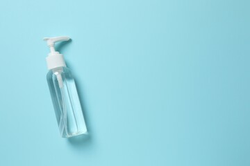 Natural cosmetic products. Cosmetic bottle on a blue background, top view