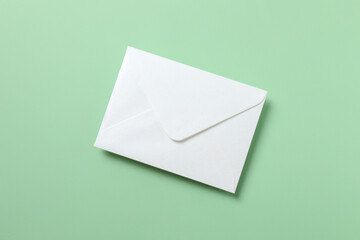 Paper envelope on green background