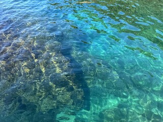 Sea crystal clear emerald blue water.