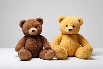 Obraz premium there are two teddy bears sitting next to each other on a table