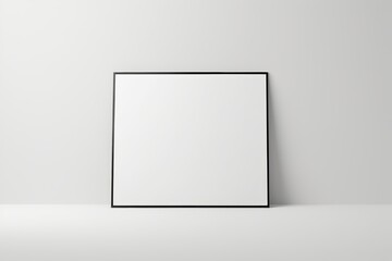 blank picture frame on the wall with a white background