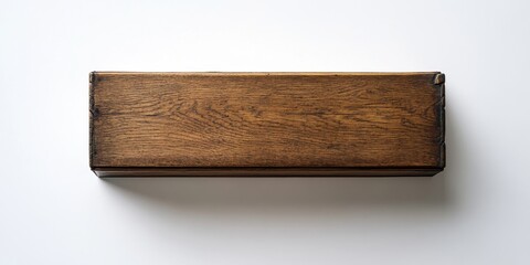 Aerial view of a vintage wooden box in rich brown tones centered on a clean white background with ample negative space for text or graphics