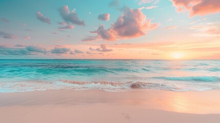 Serene beach landscape at sunset with soft pastel tones of pink and blue in the sky reflecting on calm ocean waves and sandy shore.