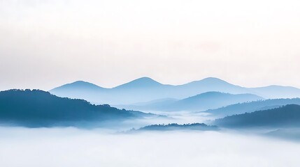 Obraz premium Misty Mountainscape Serene Blue Hues Dawn Landscape