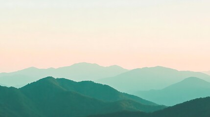 Fototapeta premium Serene Green Mountains Under a Pale Sky