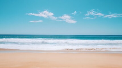 Fototapeta premium Serene Beachscape Under a Bright Blue Sky
