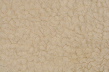 A close-up shot of merino wool bathrobe detail showcasing the soft, textured fibers of the fabric
